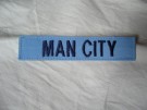 Manchester City strip med kardborre